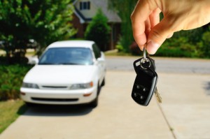 Handing over the keys to a used car.